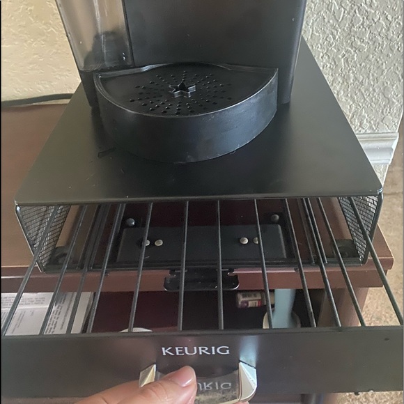 A keurig coffee making with pod storage. - Picture 2 of 2